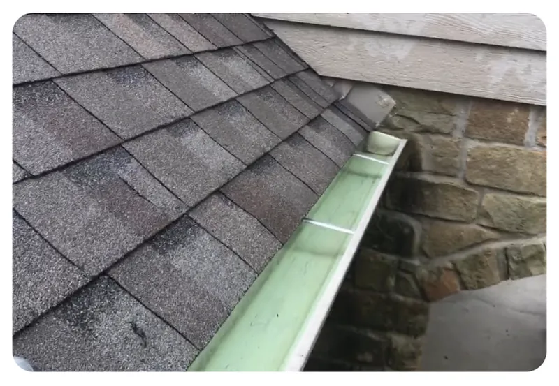 Gutter and roof edge clean and clear after professional pressure washing